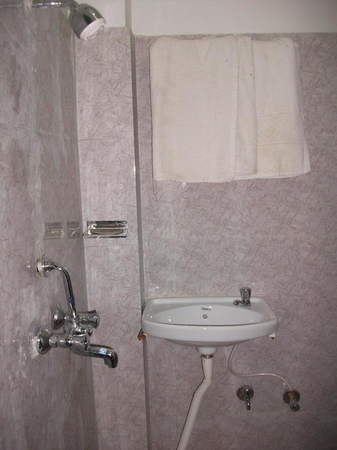 Holy City Inn Varanasi Habitación foto